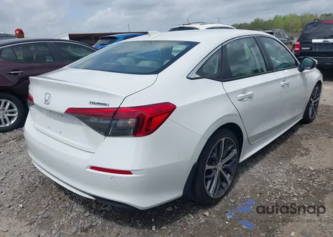 2023 Honda Civic Touring from USA, damaged, VIN 2HGFE1F98PH323369